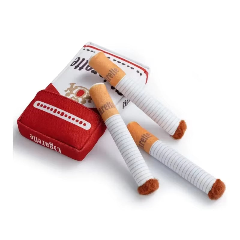 Red cigarette pack with plush chew toy cigarettes on a white background